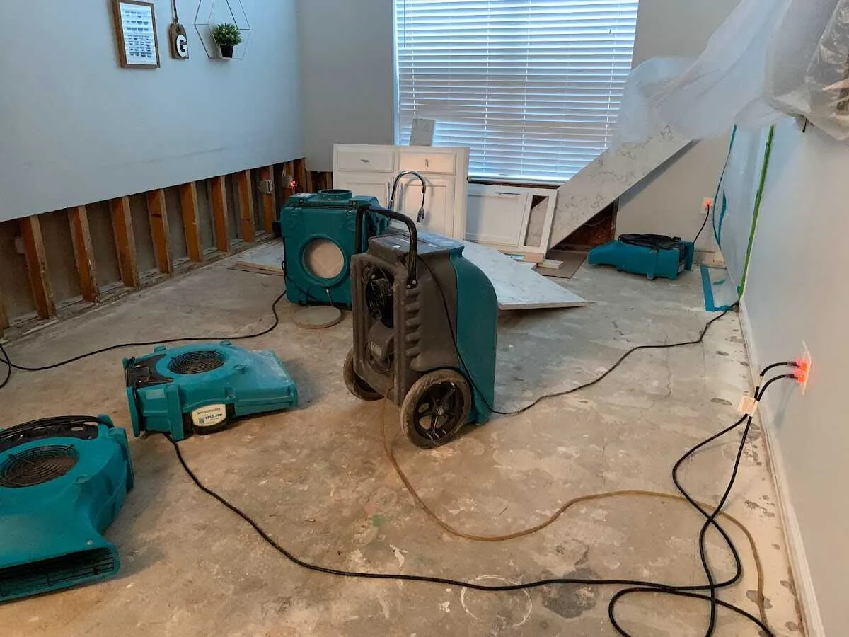 Dehumidifier in flood-cut room for Water Damage Restoration in New Richmond